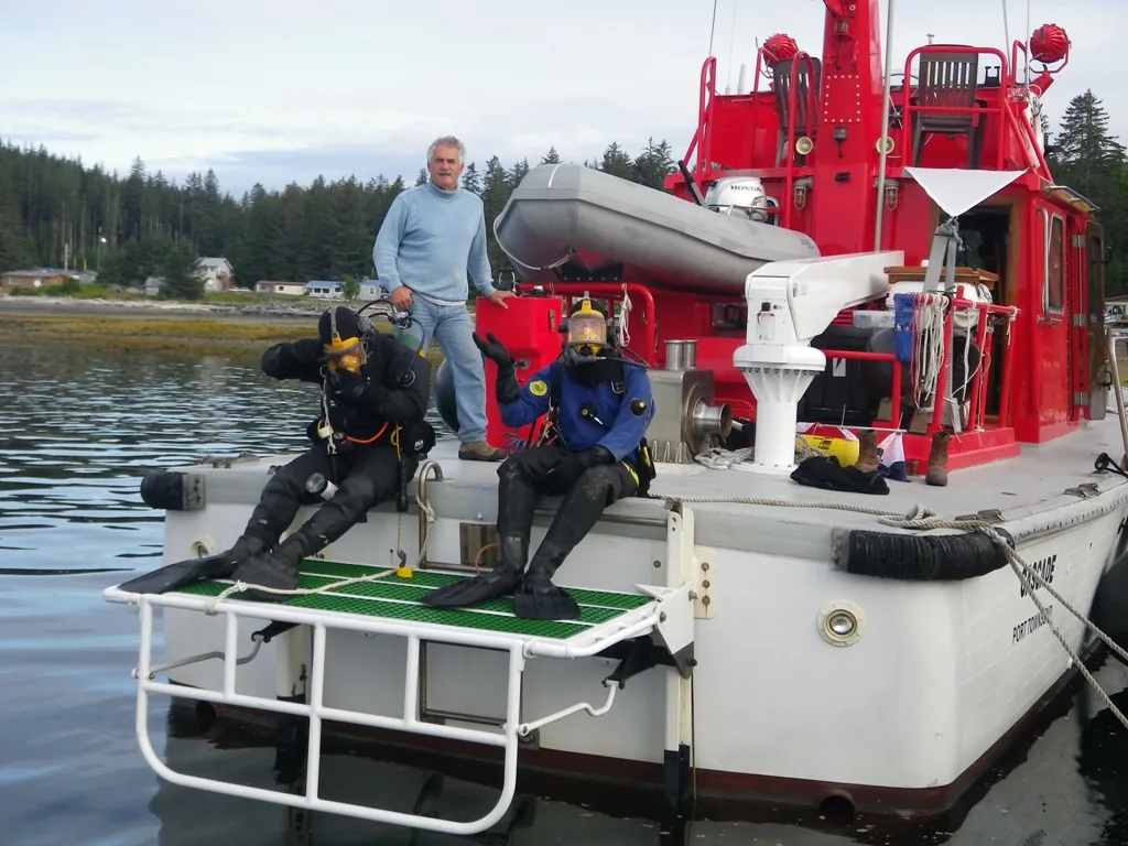 Divers staged on CASCADE stern platform for an underwater operation