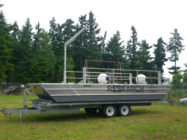 Aluminum work barge on its trailer