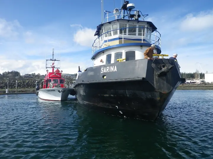 CASCADE assisting the tug SARINA